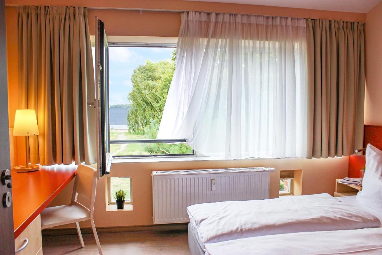 Prima Inn Ferienwohnungen Sonnenufer Am Ruppiner See Нойрупин Екстериор снимка